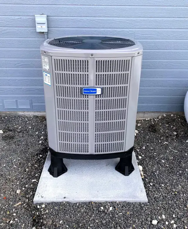 American Standard condenser on a pad