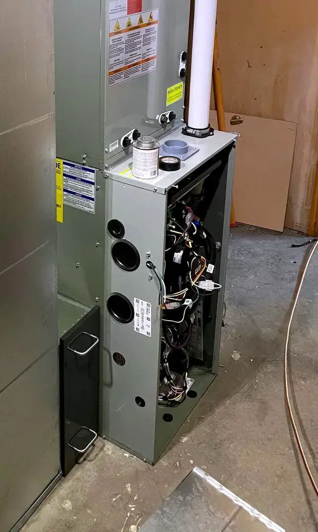 Furnace with the service panel open